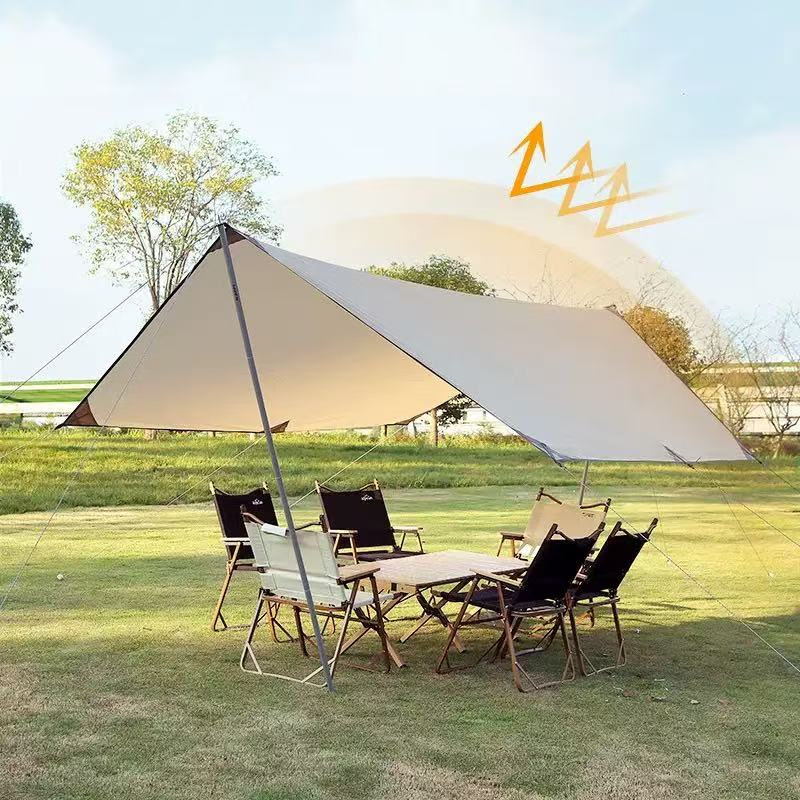 Camping tarp over an outdoor table
